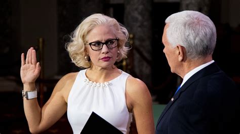 sinema sexy|Kyrsten Sinemas dress draws attention at Senate swearing